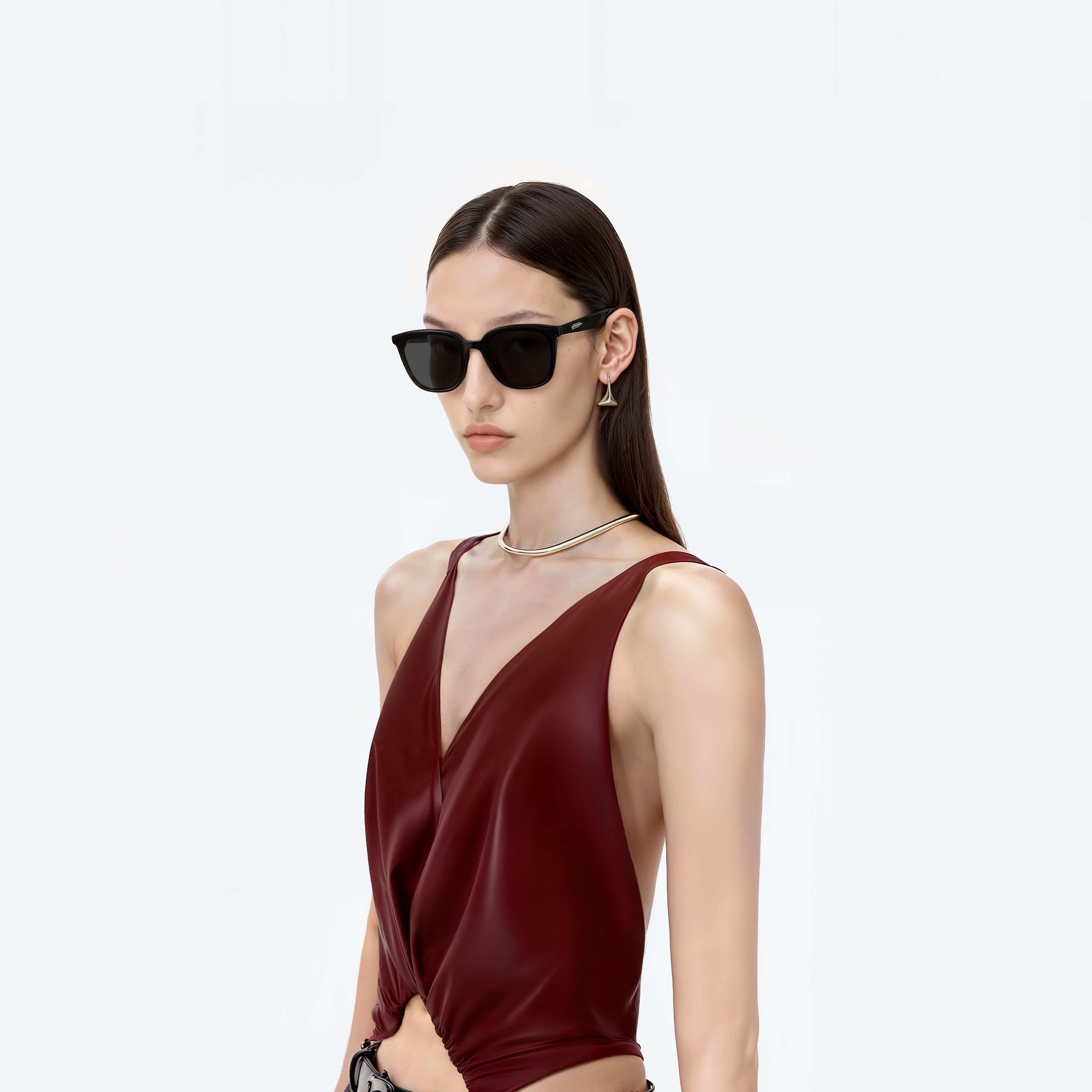 Gentle Monster Lilit 01 — model wearing the black square sunglasses