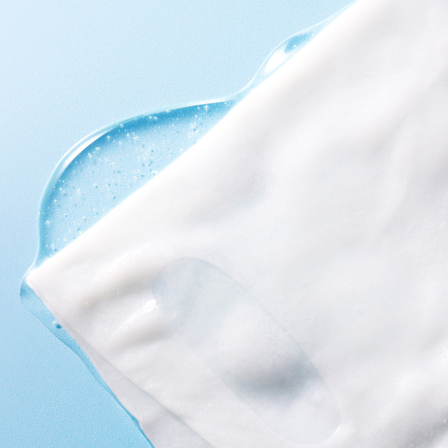 Close-up of the essence-soaked sheet texture.