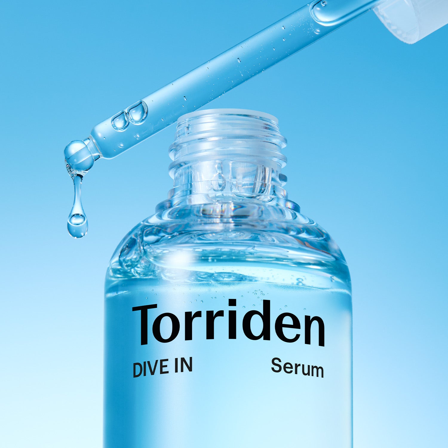 Dropper and bottle-neck close-up.